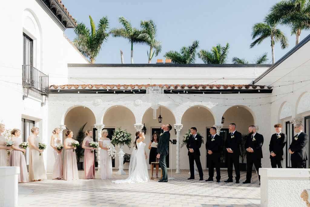 bride and groom at the Alderman House by Mizner 