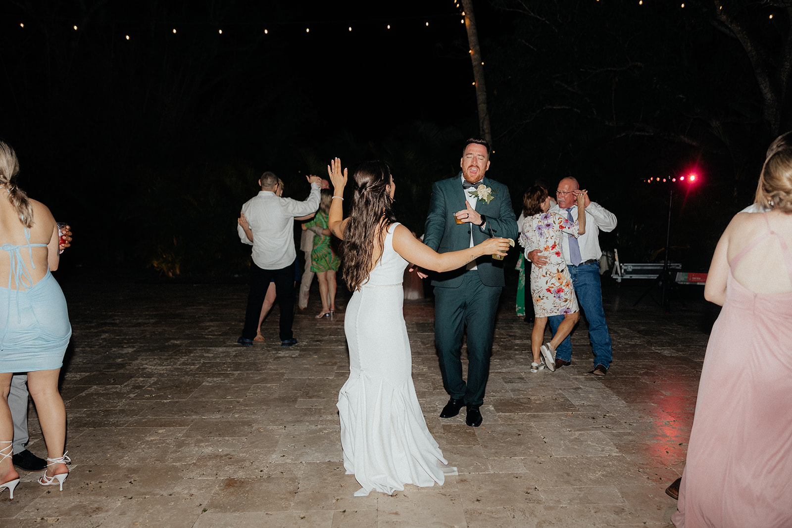 bride dancing with guests