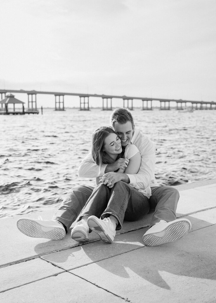 Couple sitting together on a dock in Fort Myers
